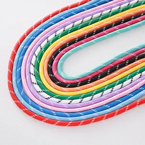 Close-up detail of 5mm colorful braided polyester ropes featuring white patterns