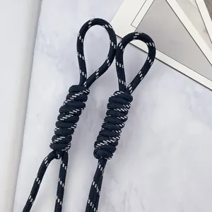Close-up of 5mm black braided polyester paracord lanyard for DIY bag and phone charms
