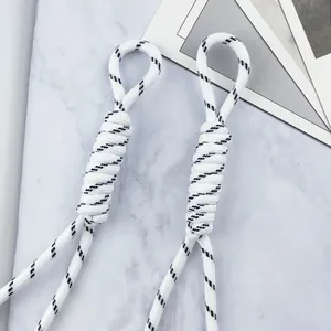 Close-up of 5mm braided polyester cord with black and white spiral pattern