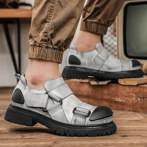 Stylish men's silver grey cowhide work shoes with a heavy duty chunky black sole
