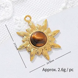 Close-up of a sun-shaped 18K gold-plated titanium steel pendant with tiger eye stone