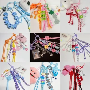 Showcase of colorful DIY keychains featuring 6mm acrylic letter beads and plush charms