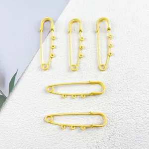 Set of five large yellow painted safety pins with loops for DIY jewelry making