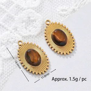 Close-up detail showing the tiger eye stone pendant with 18K gold plating and measurements
