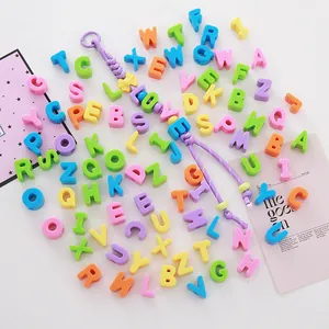 Macro detail of vibrant colorful 6mm acrylic letter beads for DIY phone chain making
