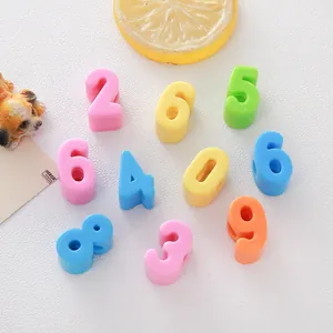 Close-up of colorful 6mm large hole acrylic number beads for DIY jewelry crafts