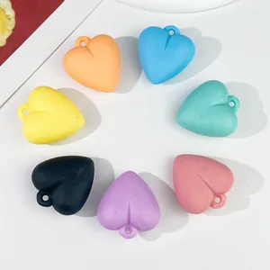 Detail view of colorful 35x32mm acrylic heart charms for DIY jewelry and keychains.