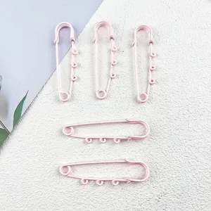 Set of five large pink lacquered safety pins with three loops for DIY jewelry and bag charms