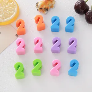 Detailed view of colorful 6mm acrylic number 2 beads for DIY jewelry and crafts
