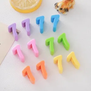 Macro detail of colorful 6mm acrylic number one beads for DIY jewelry and crafts