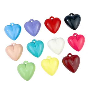 Colorful 35x32mm acrylic heart charms with holes for DIY jewelry and keychains.