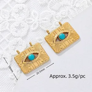 Detail of 18K gold-plated stainless steel Evil Eye pendant with turquoise stone
