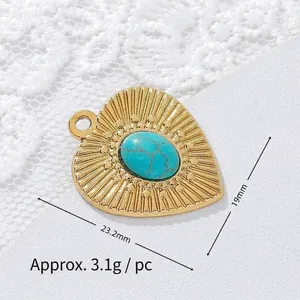 Detailed view of gold-plated heart pendant with turquoise inlay and measurements
