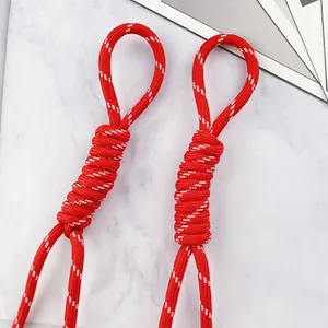 Close-up of red 5mm braided polyester lanyard with white dashed pattern