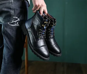 Detailed side view of men's retro black leather Martin boots featuring blue trim accents
