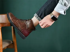 High-quality detail of men's retro brown leather high-top boot in British style