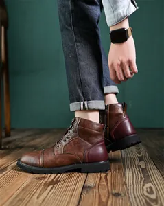 Retro brown men's high-top leather boots with side zipper and stitched toe detail