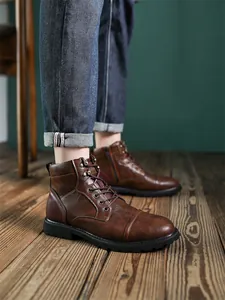 Detailed view of men's retro brown leather Martin boots featuring a high-top lace-up design