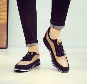 Detailed on-foot view of men's casual two-tone slip-on loafers perfect for driving