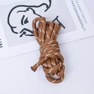 Close-up of a 5mm brown and white woven paracord for DIY bag straps and keychains