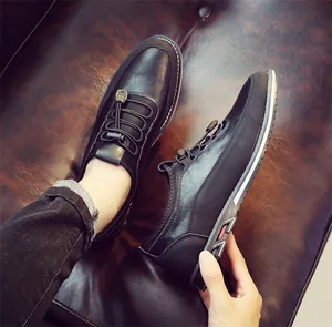 Detailed view of stylish black breathable men's casual loafers with elastic laces