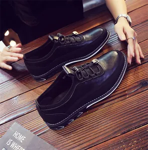 Close-up of black breathable men's casual loafers featuring elegant slip-on design