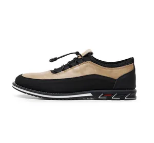 Detail side view of men's black and tan breathable casual slip-on driving loafers.