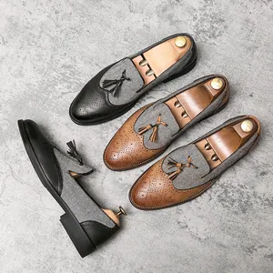 Elegante Britse brogue-loafers voor heren met kwastjes en visgraat patchwork ontwerp.