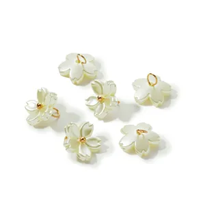 Detailed view of iridescent pearlescent ABS flower pendants for DIY jewelry crafts