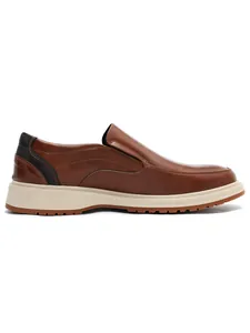 Side detail view of stylish brown leather business loafers for men with durable beige sole.