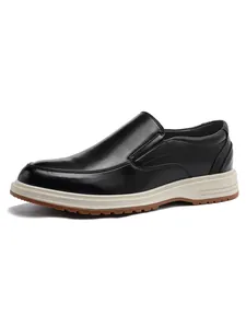 Close-up of black leather business casual loafers featuring a durable contrast rubber sole