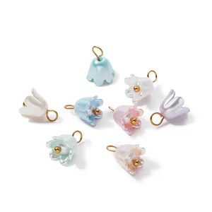 Detailed view of colorful ABS imitation pearl flower pendants with gold rings