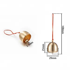 Technical diagram showing dimensions of matte brass bell with 108mm red hanging cord