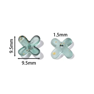 Detailed view of 9.5mm acrylic flower beads with gold flecks for DIY jewelry making