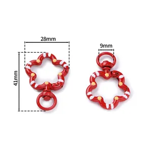 Primer plano de cierres de resorte en forma de flor roja con dimensiones en mm