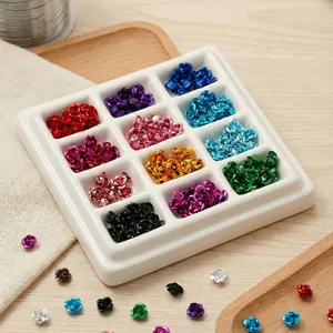 Macro view of colorful 3D aluminum rose flower charms for DIY necklace and bracelet jewelry making