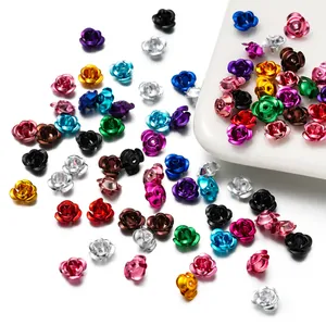 Close-up view of vibrant colorful 3D aluminum rose flower charms for DIY jewelry making