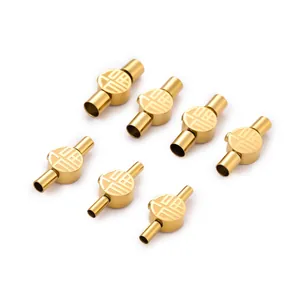 Detailed view of gold stainless steel Fu character clasps for DIY jewelry making