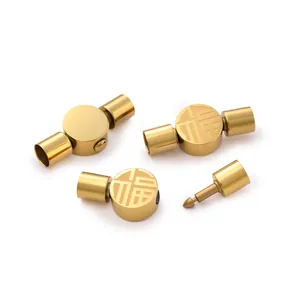 Detailed view of golden stainless steel clasp with Fu character for DIY jewelry making.