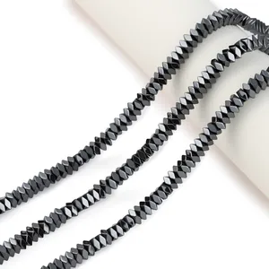 Macro view of high-quality faceted black hematite diamond beads for DIY jewelry making