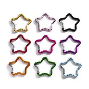 Collection de mousquetons en aluminium en forme d'étoile en neuf couleurs vives