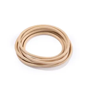 Close-up of 3.0mm beige wax cord showing snake-skin woven texture for DIY jewelry making.