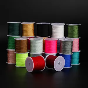 Vue détaillée de bobines de fil de jade coloré de 0,4mm pour la création de bijoux DIY