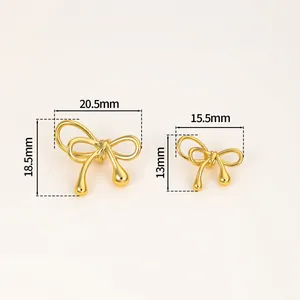 Detail view of gold plated bow spacer beads with precise dimensions for DIY jewelry