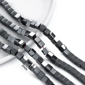 Macro detail of 2mm black cubic hematite beads for DIY jewelry making