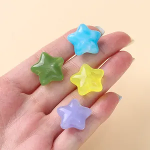Detailed view of candy-colored acrylic star beads showing their smooth texture