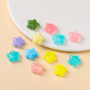 Close-up macro view of colorful candy-colored acrylic star beads for DIY jewelry making
