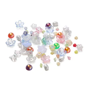 Mixed pastel acrylic beads in flower and bow shapes for DIY nail art and jewelry making