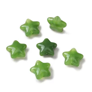 Detailed view of green translucent acrylic star beads for DIY jewelry making crafts