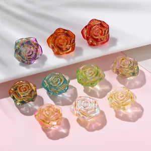 Detailed view of colorful translucent glass rose beads with gold painted edges for DIY jewelry